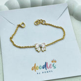 Pink Bow Bracelet 1.64 Grams, 14KT Gold